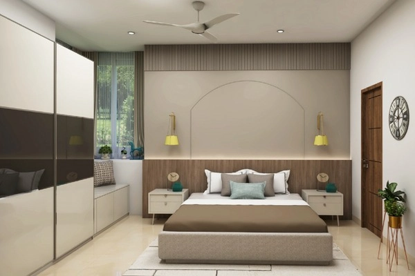 the floor to ceiling sliding wardrobe in earthy toned bedroom2